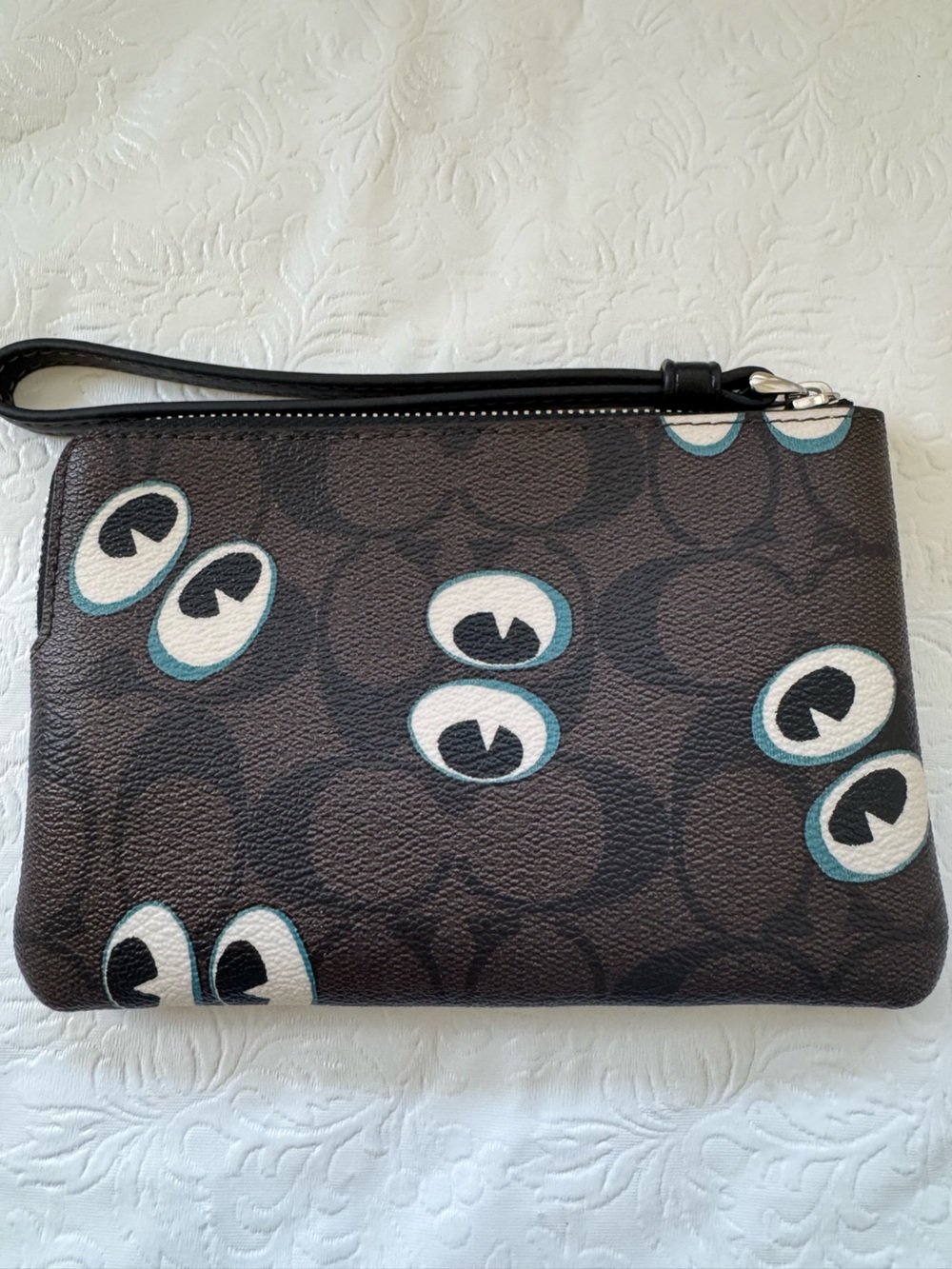Coach Brown Signature Canvas Wristlet with White and Teal Eye Motifs